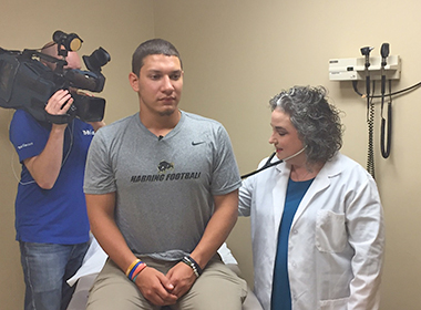 Routine Exam with Dr. Rachel White Uncovers a Herniated Disc in a Cabot Football Player